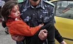 wounded girl is carried in Gaza 14 01 09